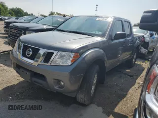 2019 Nissan Frontier Pro-4X with VIN 1N6AD0EVXKN873772, listed as a Copart auction lot 59573645 with 103,574 mi miles and Salvage title. Bid and sale history available at DreamBid. Image 1.