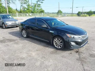 2015 Kia Optima EX with VIN KNAGN4AD7F5090393, listed as a IAAI auction lot 42632332 with 205,227 mi miles and . Bid and sale history available at DreamBid. Image 1.