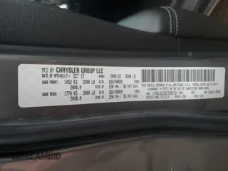 2013 Dodge Durango Citadel z VIN 1C4RDJEG3DC589718, wystawiony jako Copart lot #78850004 z przebiegiem 215 349 mil mil oraz Szkoda całkowita • Salvage title. Historia ofert i sprzedaży dostępna na DreamBid. Obrazek 13.