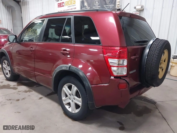 2006 Suzuki Grand Vitara Luxury with VIN JS3TD947264106126, listed as a IAAI auction lot 41961693 with 146,105 mi miles. Bid and sale history available at carsss.com. Image 3.