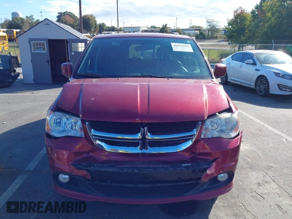 2014 Dodge Grand Caravan SXT with VIN 2C4RDGCG8ER311850, listed as a IAAI auction lot 40598088 with 138,010 mi miles and . Bid and sale history available at DreamBid. Image 12.