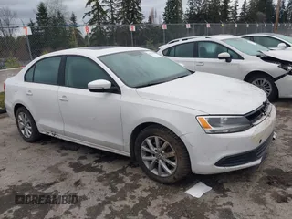 2011 Volkswagen Jetta Sedan SE PZEV with VIN 3VWDZ7AJ2BM311496, listed as a IAAI auction lot 41722414 with 84,957 mi miles. Bid and sale history available at carsss.com. Image 1.