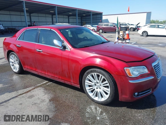 2012 Chrysler 300 Limited with VIN 2C3CCACG5CH165341, listed as a IAAI auction lot 42036190 with 184,536 mi miles. Bid and sale history available at carsss.com. Image 1.