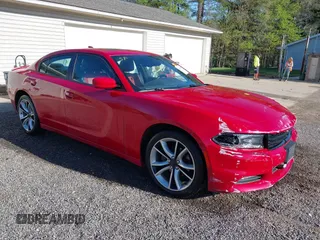 2015 Dodge Charger SXT with VIN 2C3CDXHGXFH858399, listed as a IAAI auction lot 42090958 with 71,488 mi miles and . Bid and sale history available at DreamBid. Image 1.