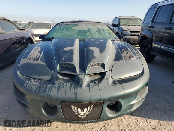2000 Pontiac Firebird Formula z VIN 2G2FV22G2Y2160915, wystawiony jako Copart lot #76196454 z przebiegiem Nie podano mil oraz Czysty tytuł • Clean title. Historia ofert i sprzedaży dostępna na DreamBid. Obrazek 5.