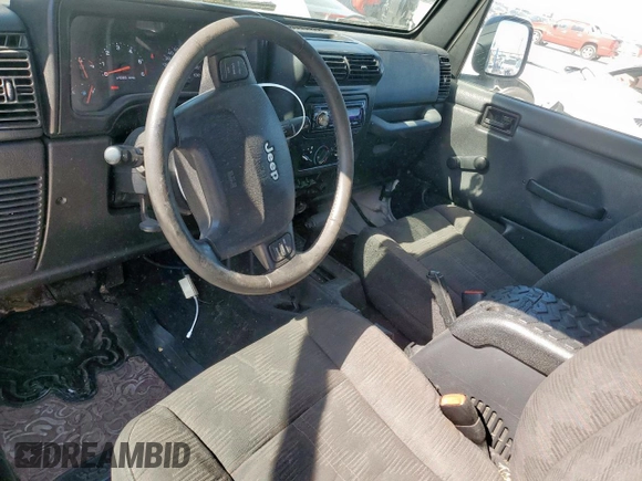 2004 Jeep Wrangler Rubicon z VIN 1J4FA69S34P757352, wystawiony jako Copart lot #52971745 z przebiegiem 139 855 mil mil oraz Szkoda całkowita • Salvage title. Historia ofert i sprzedaży dostępna na DreamBid. Obrazek 8.