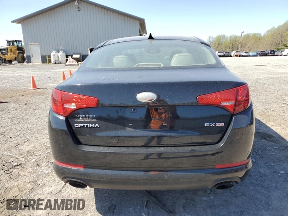 2013 Kia Optima EX z VIN 5XXGN4A71DG197381, wystawiony jako Copart lot #53619615 z przebiegiem 100 873 mil mil oraz Szkoda całkowita • Salvage title. Historia ofert i sprzedaży dostępna na DreamBid. Obrazek 6.