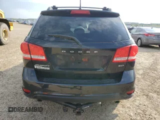 2015 Dodge Journey SXT with VIN 3C4PDCCG5FT559021, listed as a Copart auction lot 60101335 with 323,930 mi miles and Salvage title. Bid and sale history available at DreamBid. Image 6.