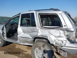 2004 Jeep Grand Cherokee Limited z VIN 1J4GW58S84C269863, wystawiony jako IAAI lot #41900325 z przebiegiem 226 587 mil mil oraz . Historia ofert i sprzedaży dostępna na DreamBid. Obrazek 6.