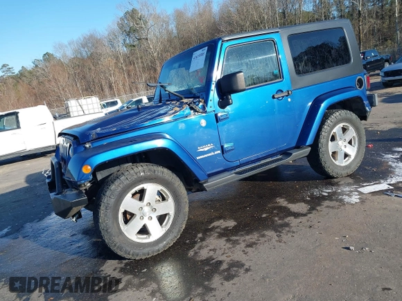 2009 Jeep Wrangler Sahara z VIN 1J4FA54199L722192, wystawiony jako IAAI lot #41619305 z przebiegiem 105 545 mil mil oraz . Historia ofert i sprzedaży dostępna na DreamBid. Obrazek 20.