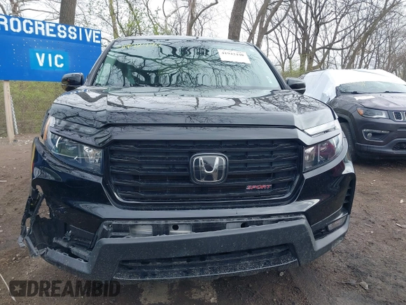 2021 Honda Ridgeline Sport with VIN 5FPYK3F19MB017134, listed as a IAAI auction lot 41942440 with 30,794 mi miles and . Bid and sale history available at DreamBid. Image 12.