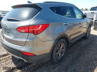 2014 Hyundai Santa Fe Sport with VIN 5XYZU3LB7EG189094, listed as a IAAI auction lot 41988073 with 201,527 mi miles. Bid and sale history available at carsss.com. Image 4.