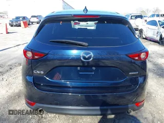 2021 Mazda CX-5 Grand Touring with VIN JM3KFADM5M0428279, listed as a IAAI auction lot 41747175 with 49,579 mi miles. Bid and sale history available at carsss.com. Image 17.