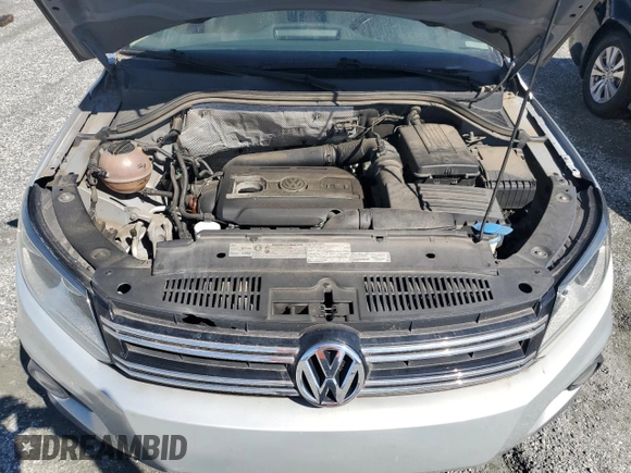 2012 Volkswagen Tiguan LE z VIN WVGAV7AX7CW525273, wystawiony jako Copart lot #46176415 z przebiegiem 155 851 mil mil oraz Czysty tytuł • Clean title. Historia ofert i sprzedaży dostępna na DreamBid. Obrazek 13.