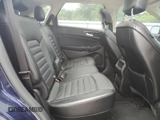 2016 Ford Edge SEL z VIN 2FMPK3J90GBB51657, wystawiony jako Copart lot #57895715 z przebiegiem 104 797 mil mil oraz Tytuł czysty. Historia ofert i sprzedaży dostępna na DreamBid. Obrazek 10.
