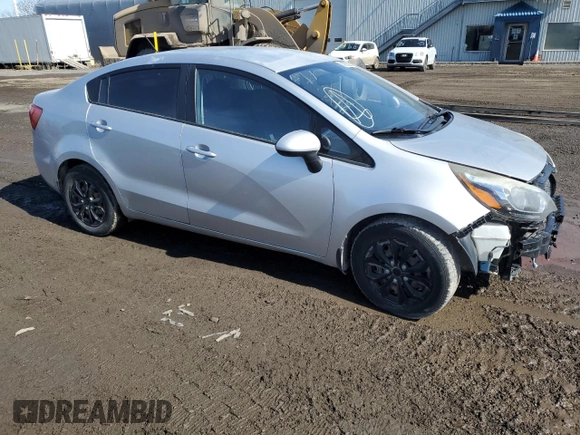 2015 Kia Rio LX with VIN KNADM4A39F6514695, listed as a Copart auction lot 52280395 with 136,824 mi miles and Salvage Title. Bid and sale history available at carsss.com. Image 4.