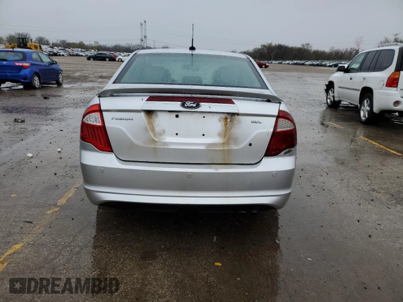 2012 Ford Fusion SEL z VIN 3FAHP0JA3CR156338, wystawiony jako Copart lot #51996885 z przebiegiem 162 892 mil mil oraz Szkoda całkowita • Salvage title. Historia ofert i sprzedaży dostępna na DreamBid. Obrazek 6.