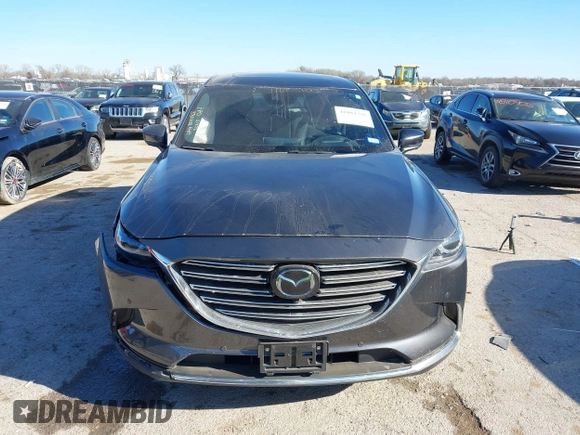 2023 Mazda CX-9 Carbon Edition z VIN JM3TCBDY2P0633889, wystawiony jako IAAI lot #41804791 z przebiegiem 20 454 mil mil oraz . Historia ofert i sprzedaży dostępna na DreamBid. Obrazek 12.