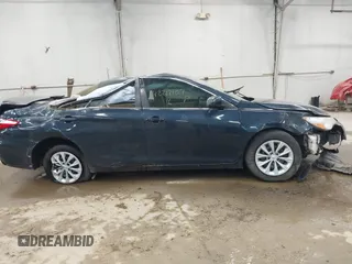 2016 Toyota Camry XLE with VIN 4T4BF1FK6GR561765, listed as a IAAI auction lot 42217107 with 36,599 mi miles and . Bid and sale history available at DreamBid. Image 13.