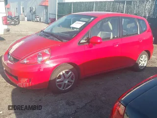 2007 Honda Fit with VIN JHMGD38497S064174, listed as a IAAI auction lot 42038262 with 74,580 mi miles. Bid and sale history available at carsss.com. Image 2.