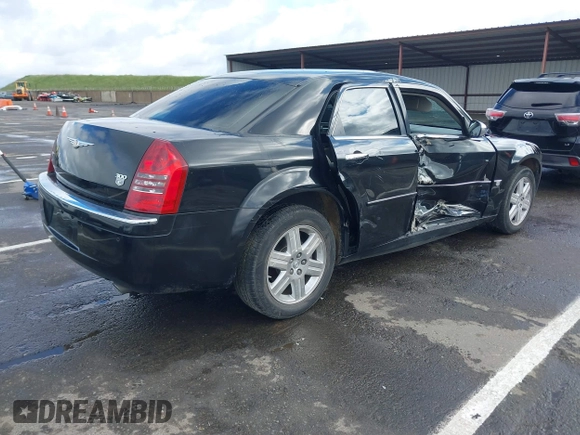 2006 Chrysler 300 C with VIN 2C3LK63H66H142437, listed as a IAAI auction lot 41751890 with 57,374 mi miles. Bid and sale history available at carsss.com. Image 4.