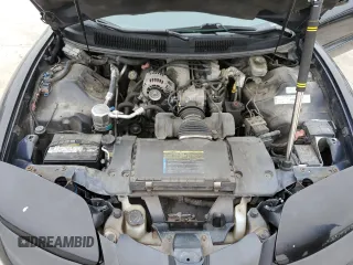1999 Pontiac Firebird Firebird z VIN 2G2FS22K0X2226888, wystawiony jako Copart lot #51380795 z przebiegiem 137 800 mil mil oraz Tytuł czysty. Historia ofert i sprzedaży dostępna na DreamBid. Obrazek 11.