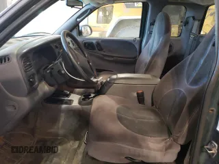 1999 Dodge Dakota SLT with VIN 1B7GG22Y9XS149398, listed as a Copart auction lot 47950025 with 173,413 mi miles and Salvage Title. Bid and sale history available at carsss.com. Image 7.