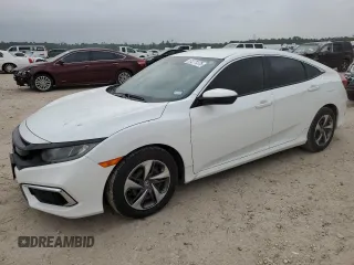2020 Honda Civic LX z VIN 19XFC2F60LE013139, wystawiony jako Copart lot #51271375 z przebiegiem 24 854 mil mil oraz Czysty tytuł • Clean title. Historia ofert i sprzedaży dostępna na DreamBid. Obrazek 1.