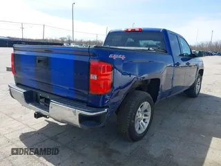2014 Chevrolet Silverado 1500 LT with VIN 1GCVKREH7EZ324598, listed as a IAAI auction lot 41943170 with 127,204 mi miles and . Bid and sale history available at DreamBid. Image 4.