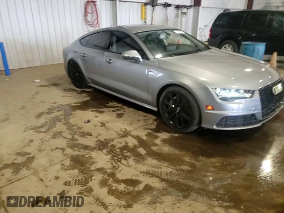 2016 Audi A7 Premium Plus z VIN WAUWGAFCXGN005178, wystawiony jako Copart lot #55498095 z przebiegiem 93 677 mil mil oraz Szkoda całkowita • Salvage title. Historia ofert i sprzedaży dostępna na DreamBid. Obrazek 14.