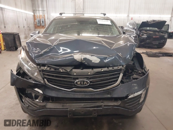 2011 Kia Sportage EX with VIN KNDPCCA27B7037886, listed as a IAAI auction lot 42264598 with 211,538 mi miles and . Bid and sale history available at DreamBid. Image 13.
