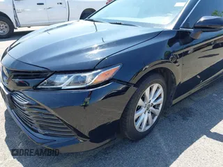 2020 Toyota Camry LE with VIN 4T1C11AKXLU955851, listed as a IAAI auction lot 41996827 with 59,008 mi miles and . Bid and sale history available at carsss.com. Image 19.