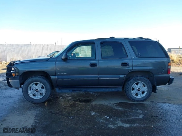 2002 Chevrolet Tahoe LS with VIN 1GNEK13V82J180328, listed as a IAAI auction lot 40810285 with 210,728 mi miles. Bid and sale history available at carsss.com. Image 14.