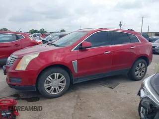 2015 Cadillac SRX Luxury Collection with VIN 3GYFNBE36FS560305, listed as a IAAI auction lot 42142934 with 160,543 mi miles and . Bid and sale history available at carsss.com. Image 14.