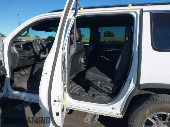 2022 Jeep Wagoneer Series I with VIN 1C4SJVAT8NS220302, listed as a IAAI auction lot 41297633 with 21,019 mi miles and . Bid and sale history available at DreamBid. Image 8.