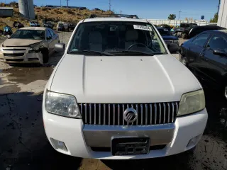 2006 Mercury Mariner Luxury with VIN 4M2CU571X6KJ13393, listed as a Copart auction lot 71995284 with 75,693 mi miles and Salvage Title. Bid and sale history available at carsss.com. Image 5.