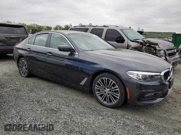 2018 BMW 5 Series 530i xDrive with VIN WBAJA7C5XJWC76816, listed as a Copart auction lot 52734405 with 77,917 mi miles and Clean Title. Bid and sale history available at carsss.com. Image 4.