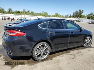 2018 Ford Fusion Titanium with VIN 3FA6P0K91JR146027, listed as a Copart auction lot 83468784 with 67,046 mi miles and Salvage title. Bid and sale history available at DreamBid. Image 3.