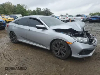 2019 Honda Civic Sport with VIN 2HGFC2F80KH583583, listed as a Copart auction lot 72145774 with 61,228 mi miles and Salvage title. Bid and sale history available at DreamBid. Image 4.