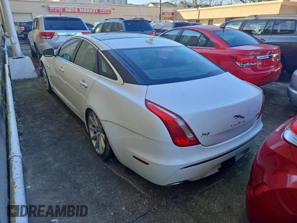2013 Jaguar XJ с VIN SAJWJ1CD7D8V49599, выставлен на аукционе Copart как лот 43230675 с пробегом 133 163 миль миль и Чистый • Clean title. История ставок и продаж доступна на DreamBid. Изображение 3.