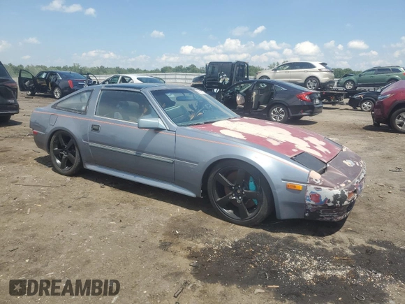1986 Nissan 300ZX GS z VIN JN1HZ16S2GX095902, wystawiony jako Copart lot #63410585 z przebiegiem 217 539 mil mil oraz Czysty tytuł • Clean title. Historia ofert i sprzedaży dostępna na DreamBid. Obrazek 4.