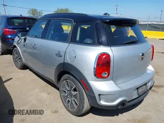 2012 MINI Countryman S with VIN WMWZC5C59CWL60076, listed as a IAAI auction lot 42078926 with 60,280 mi miles and . Bid and sale history available at DreamBid. Image 3.