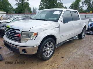 2014 Ford F-150 XL with VIN 1FTFW1CTXEKF15524, listed as a IAAI auction lot 42109740 with 154,554 mi miles and . Bid and sale history available at DreamBid. Image 2.