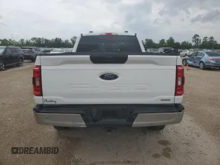 2022 Ford F-150 XL with VIN 1FTFW1E82NFA51713, listed as a Copart auction lot 54581755 with 69,966 mi miles and Salvage Title. Bid and sale history available at DreamBid. Image 6.