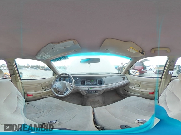 1999 Ford Crown Victoria z VIN 2FAFP73W4XX137040, wystawiony jako Copart lot #83741244 z przebiegiem 142 901 mil mil oraz Szkoda całkowita • Salvage title. Historia ofert i sprzedaży dostępna na DreamBid. Obrazek 13.
