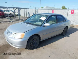2001 Honda Civic EX with VIN 2HGES26771H512949, listed as a IAAI auction lot 42020043 with 299,833 mi miles. Bid and sale history available at carsss.com. Image 2.