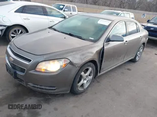 2010 Chevrolet Malibu 1LT with VIN 1G1ZC5EB4AF153574, listed as a IAAI auction lot 41670974 with 163,184 mi miles and . Bid and sale history available at DreamBid. Image 2.