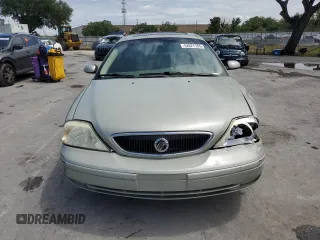 2003 Mercury Sable LS Premium с VIN 1MEFM55S23A617225, выставлен на аукционе Copart как лот 52021765 с пробегом 131 291 миль миль и Списание • Salvage title. История ставок и продаж доступна на DreamBid. Изображение 5.