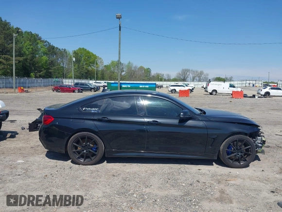 2019 BMW 4 Series 430i with VIN WBA4J1C59KBM17309, listed as a IAAI auction lot 42011443 with 87,189 mi miles. Bid and sale history available at carsss.com. Image 14.