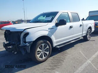 2019 Ford F-150 XL with VIN 1FTEW1C59KKE70231, listed as a IAAI auction lot 41992437 with 58,600 mi miles and . Bid and sale history available at DreamBid. Image 2.